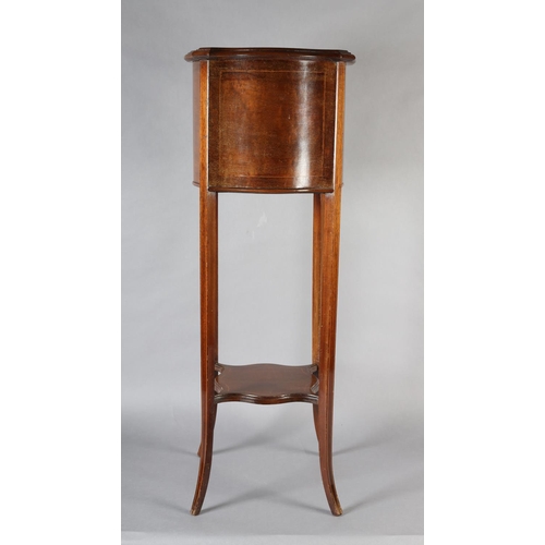 357 - AN EDWARD VII MAHOGANY AND SATINWOOD STRUNG JARDINIERE STAND of serpentine square form on tapering l... 