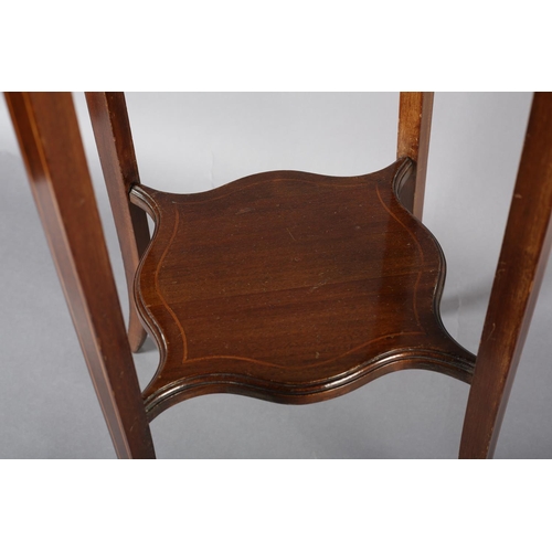 357 - AN EDWARD VII MAHOGANY AND SATINWOOD STRUNG JARDINIERE STAND of serpentine square form on tapering l... 