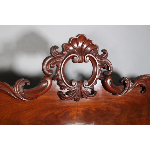 369 - A VICTORIAN FIGURED MAHOGANY PEDESTAL SIDEBOARD, the raised back with carved shell foliate and C-scr... 