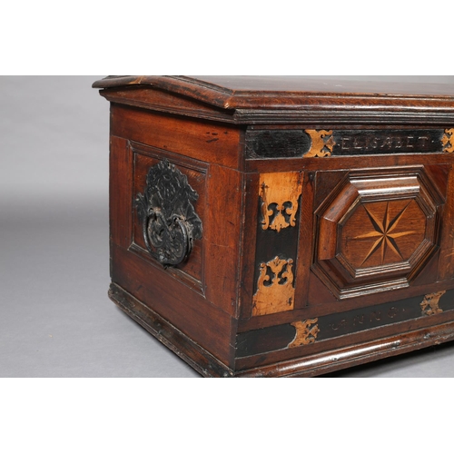 381 - AN 18TH CENTURY DUTCH COLONIAL TEAK AND EBONY TRUNK, having a low domed lid and twin panels to the f... 