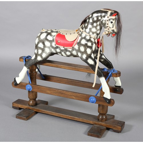 382 - A MID/LATE 20TH CENTURY ROCKING HORSE in the style of Collinson having black and white dappled body ... 