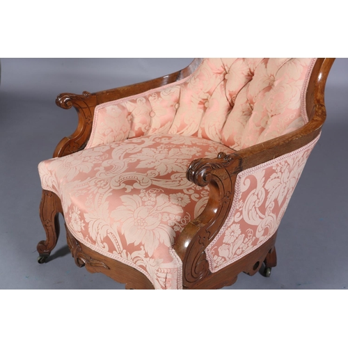 407 - A 19TH CENTURY WALNUT ARMCHAIR, having an encircling frame with pierced and carved foliate cresting ... 