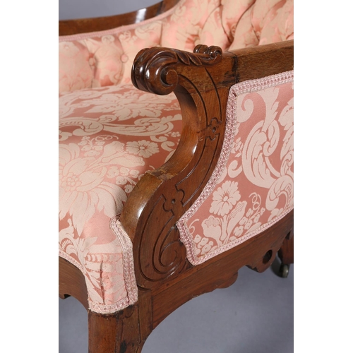 407 - A 19TH CENTURY WALNUT ARMCHAIR, having an encircling frame with pierced and carved foliate cresting ... 