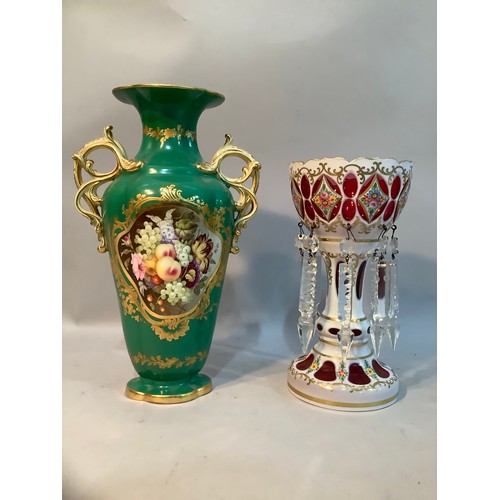 59 - A 19th century Bohemian cranberry and white glass overlay lustre painted with flowers and gilt scrol... 