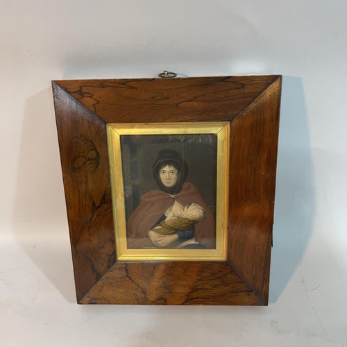 152 - A 19th century rosewood frame with gilt slip and hanging loop, 27.5cm x 24cm containing an overpaint... 