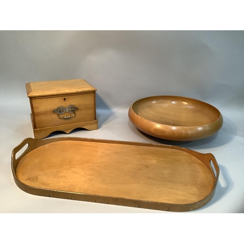 171 - A blonde wood two handled tray with finger grips, 59cm together with a turned wood bowl, 36.5cm diam... 