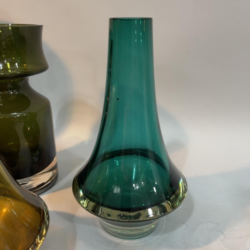 188 - Two Rihimaki, Finland, glass vases in emerald and amber with stamp to base and no.1379 to both, 20.5... 