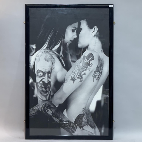 196 - Four framed photographic prints depicting tattooed figures including David Beckham, largest example ... 