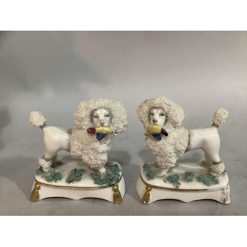 229 - Two Staffordshire figures of a Scottish man and woman with stags, (A/F) two small spill vases, two S... 