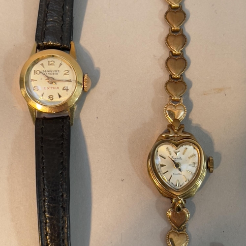 352 - An Everite Ladies wristwatch c1964, heart shaped case on an integral heart linked bracelet all in 9c... 