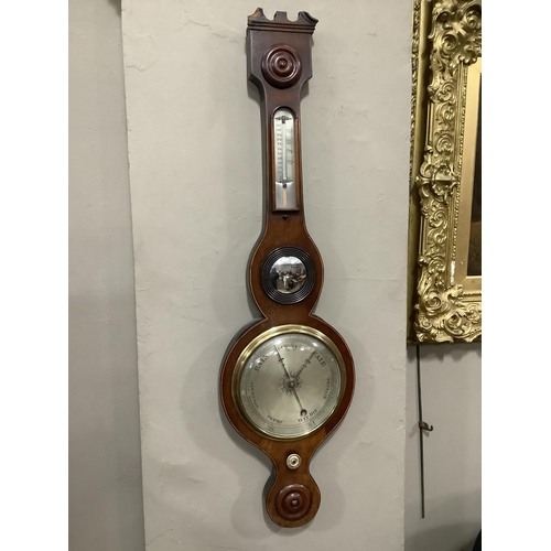 361 - An early 19th century mahogany banjo barometer with boxwood stringing, silvered dial, convex mirror ... 