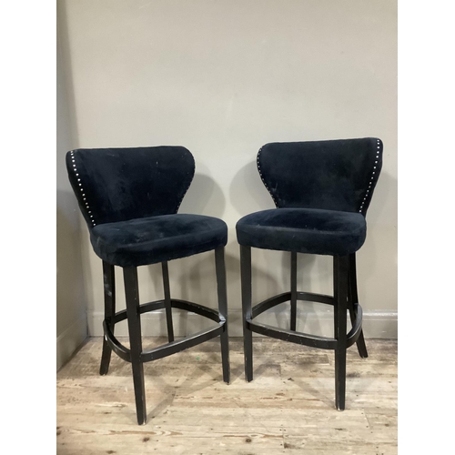 364 - A pair of black bar chairs with close nail studding