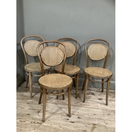 403 - A set of four bentwood and begere caned dining chairs