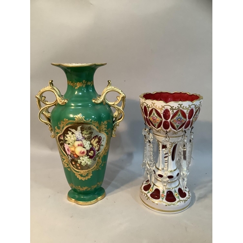 59 - A 19th century Bohemian cranberry and white glass overlay lustre painted with flowers and gilt scrol... 