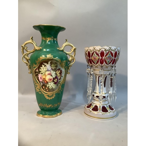 59 - A 19th century Bohemian cranberry and white glass overlay lustre painted with flowers and gilt scrol... 