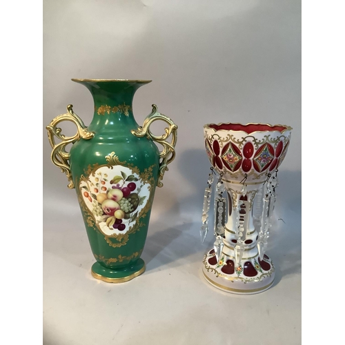 59 - A 19th century Bohemian cranberry and white glass overlay lustre painted with flowers and gilt scrol... 