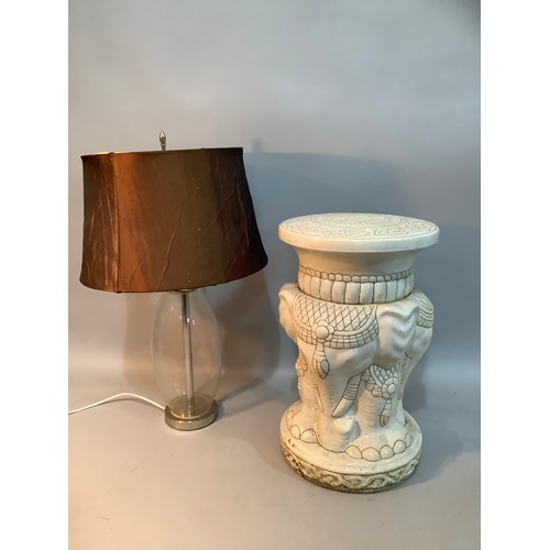 232 - A glass bodied table lamp with chrome mounts and shade together with a white ceramic garden seat for... 