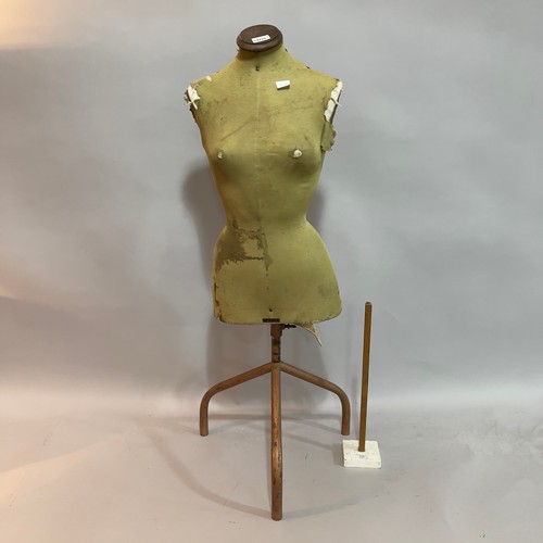 404 - A vintage Singer's tailors dummy on metal stand together with a hem measure