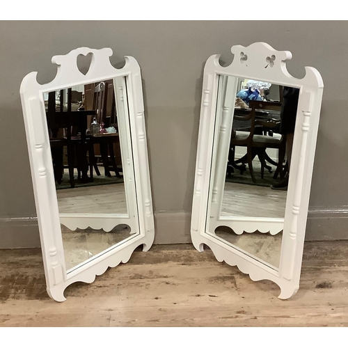 129 - Two cream painted wall mirrors with cut out heart and spade motifs to the cresting