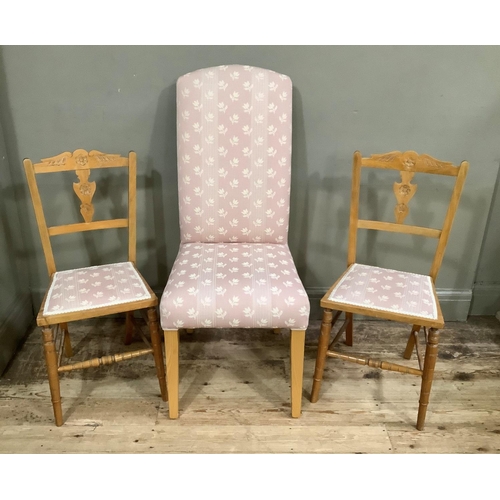 130 - A modern single chair upholstered in pink and ivory woven fabric, on beech legs together with a pair... 