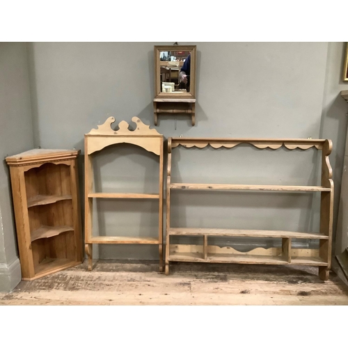 131 - A set of open pine wall shelves with two shelves and three open compartments, 105cm wide together wi... 