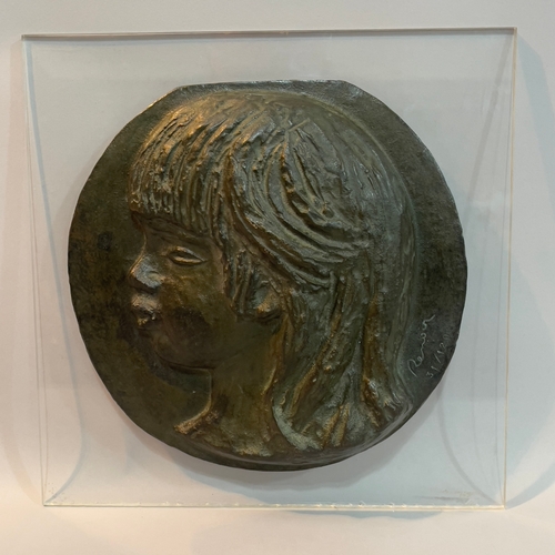 46 - After Pierre-Auguste Renoir, a cast bronze medallion of the profile of Coco the youngest son of Reno... 