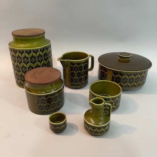 132 - Hornsea pottery 'Heirloom' ware in olive green/black including two storage jars, 20cm and 11.5cm hig... 