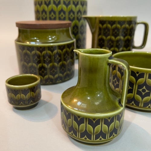 132 - Hornsea pottery 'Heirloom' ware in olive green/black including two storage jars, 20cm and 11.5cm hig... 