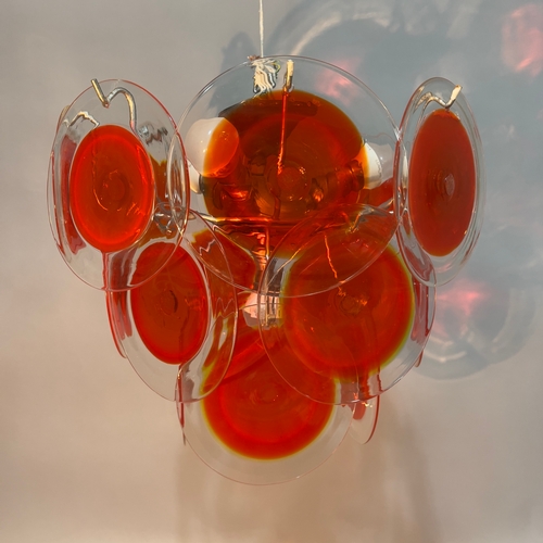 1 - Gino Vistosi (1925-1980) for Venini c.1960s, Murano orange glass disc four light chandelier, the met... 