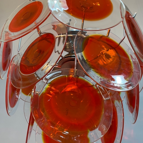 1 - Gino Vistosi (1925-1980) for Venini c.1960s, Murano orange glass disc four light chandelier, the met... 