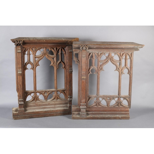 123 - Architectural Salvage: a pair of bleached oak front panels having a central arch with Gothic tracery... 