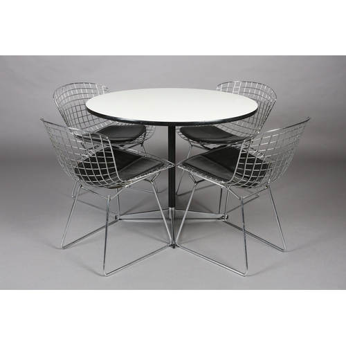 71 - A set of four Bertoia style wire work chairs with black seat pads, after the original design for Kno... 