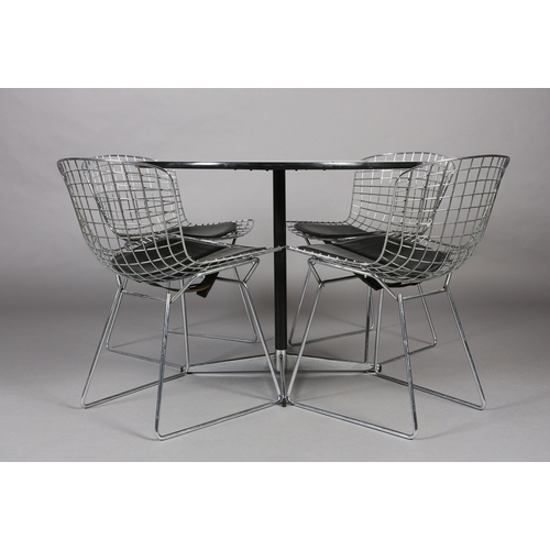 71 - A set of four Bertoia style wire work chairs with black seat pads, after the original design for Kno... 