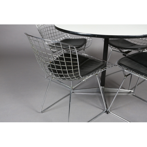 71 - A set of four Bertoia style wire work chairs with black seat pads, after the original design for Kno... 