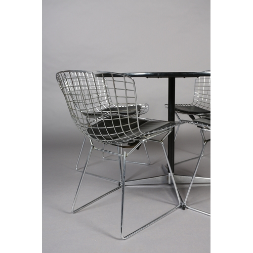 71 - A set of four Bertoia style wire work chairs with black seat pads, after the original design for Kno... 