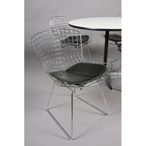 71 - A set of four Bertoia style wire work chairs with black seat pads, after the original design for Kno... 