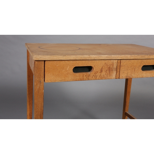 82 - A pale oak side table, having two frieze drawers with black lined finger grip handles, on square leg... 