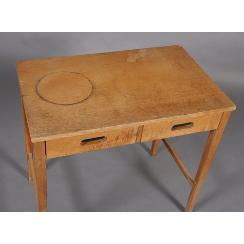 82 - A pale oak side table, having two frieze drawers with black lined finger grip handles, on square leg... 