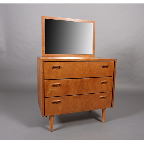 83 - A Stag teak and mirrored dressing chest of three drawers and a black Formica topped bedside cupboard... 