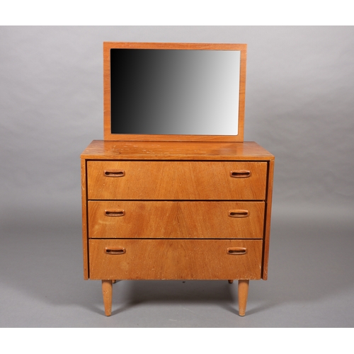 83 - A Stag teak and mirrored dressing chest of three drawers and a black Formica topped bedside cupboard... 