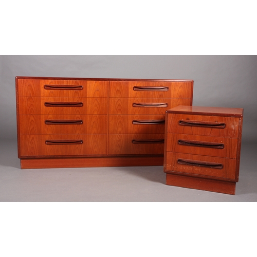 85 - A G-Plan teak chest of two banks of four drawers with curved linear handles on recessed plinth base,... 