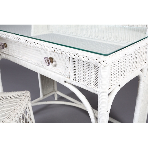 89 - A white basket weave desk having a short raised back above a drawer to the apron on rounded framing ... 