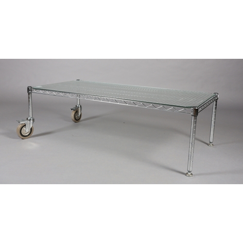 90 - An InterMetro Louis Maslow Metropolitan Wire Goods steel and glass coffee table, rectangular on lock... 