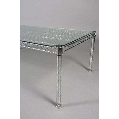 90 - An InterMetro Louis Maslow Metropolitan Wire Goods steel and glass coffee table, rectangular on lock... 