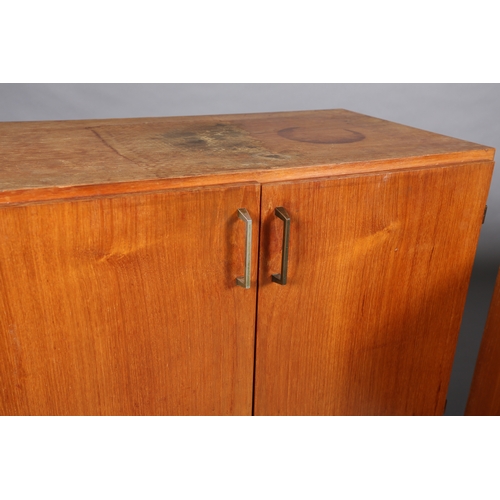 91 - A teak hi-fi cabinet with two lift up tops with divided interior, black apron and on tapered legs (n... 