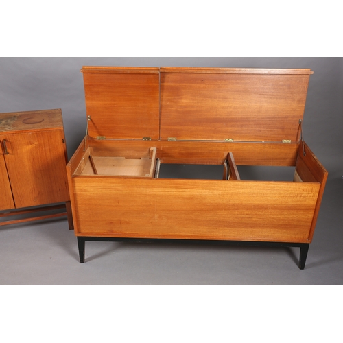 91 - A teak hi-fi cabinet with two lift up tops with divided interior, black apron and on tapered legs (n... 