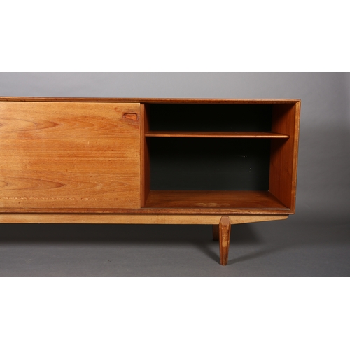 27 - Drylund, Denmark c. early 1970s, a teak sideboard having five drawers to the centre flanked by a sli... 