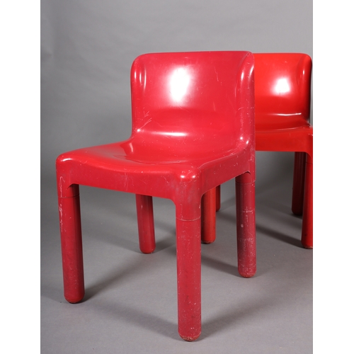 28 - Carlo Bartoli for Kartell, Italy, a set of four '4875' red injection moulded polypropylene chairs, c... 