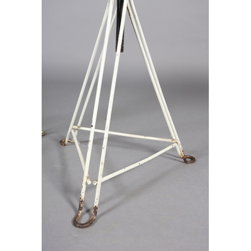 30 - A pair of 1960s white iron revolving stools on triangular frame with PVC upholstered seat