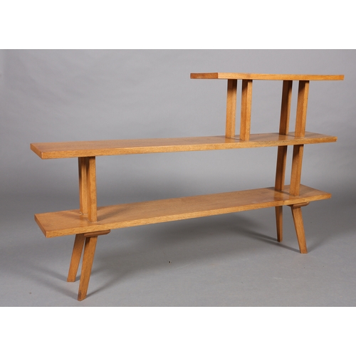 117 - A Heal's style oak set of open bookshelves on splayed legs, 122cm wide x 20cm deep x 77cm high